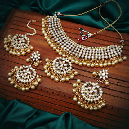 Sukkhi Trendy Kundan Gold Plated Pearl Choker Necklace Set with Dangler Earrings & Maangtikka for Women & Girls (N73544)